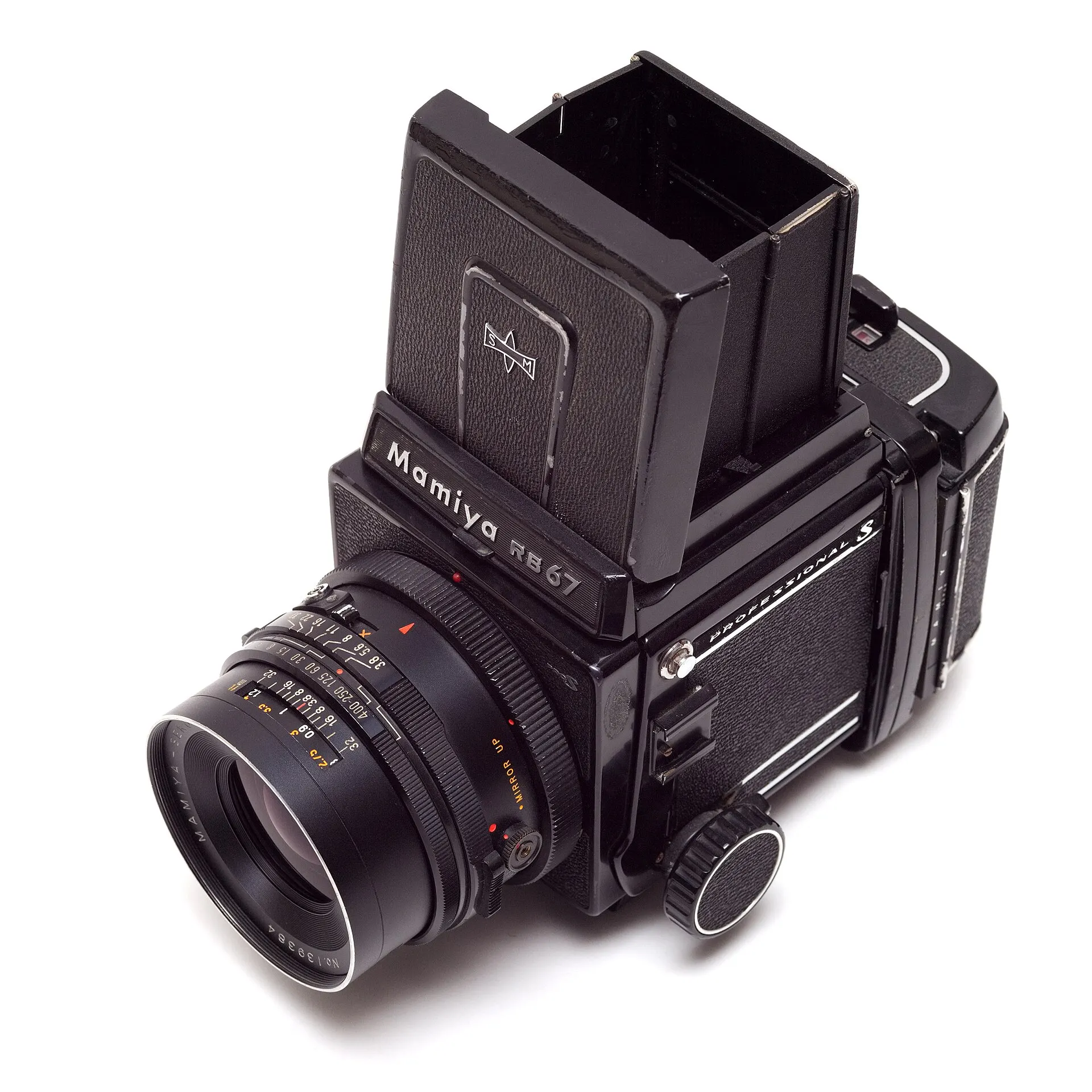 Mamiya RB67 medium format camera with its waist-level finder open and a Mamiya-Sekor lens mounted, on a white background