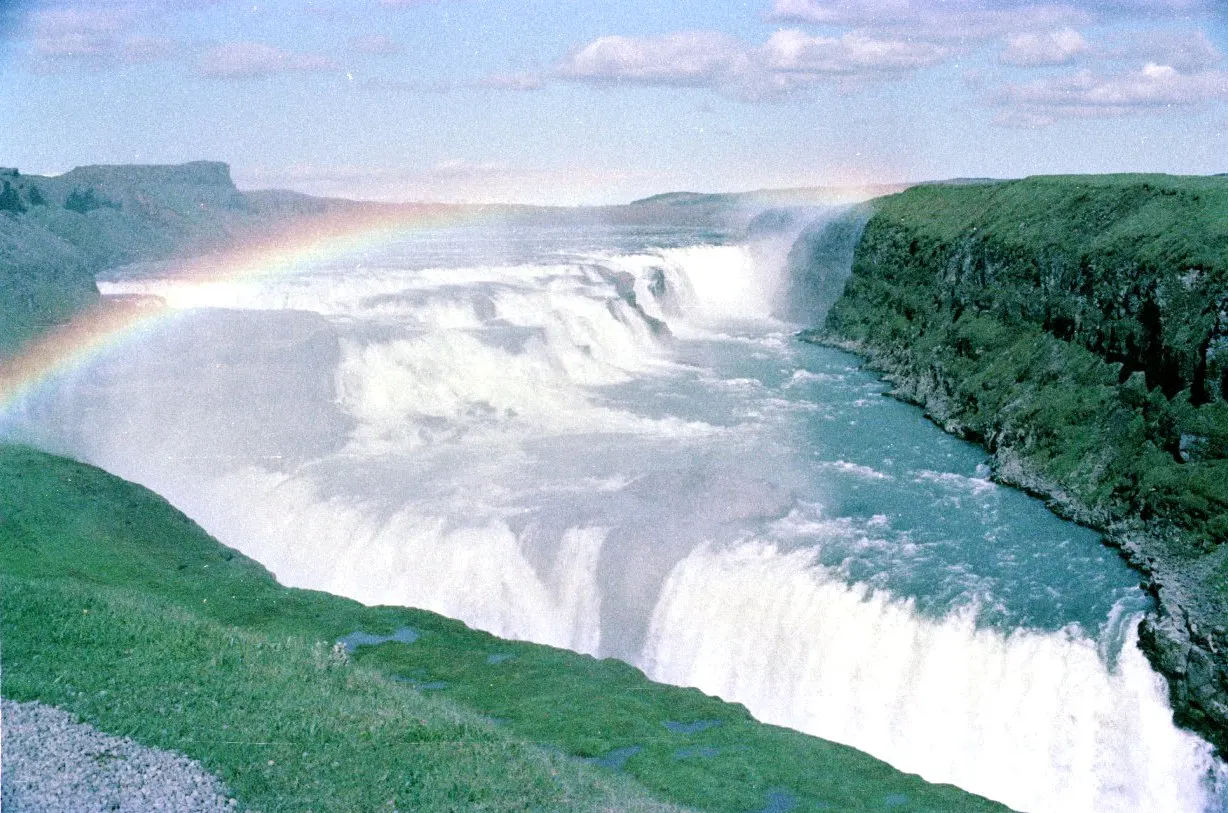A rainbow over the Gullfoss waterfall in Iceland